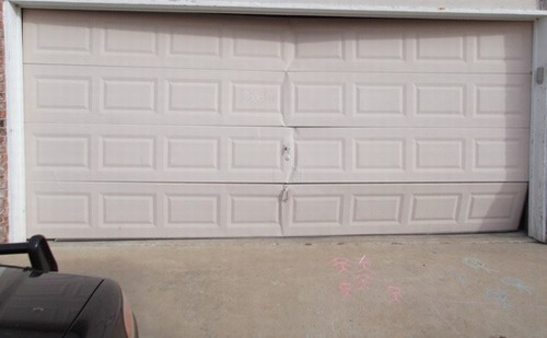 Garage Door Befor Repair Image