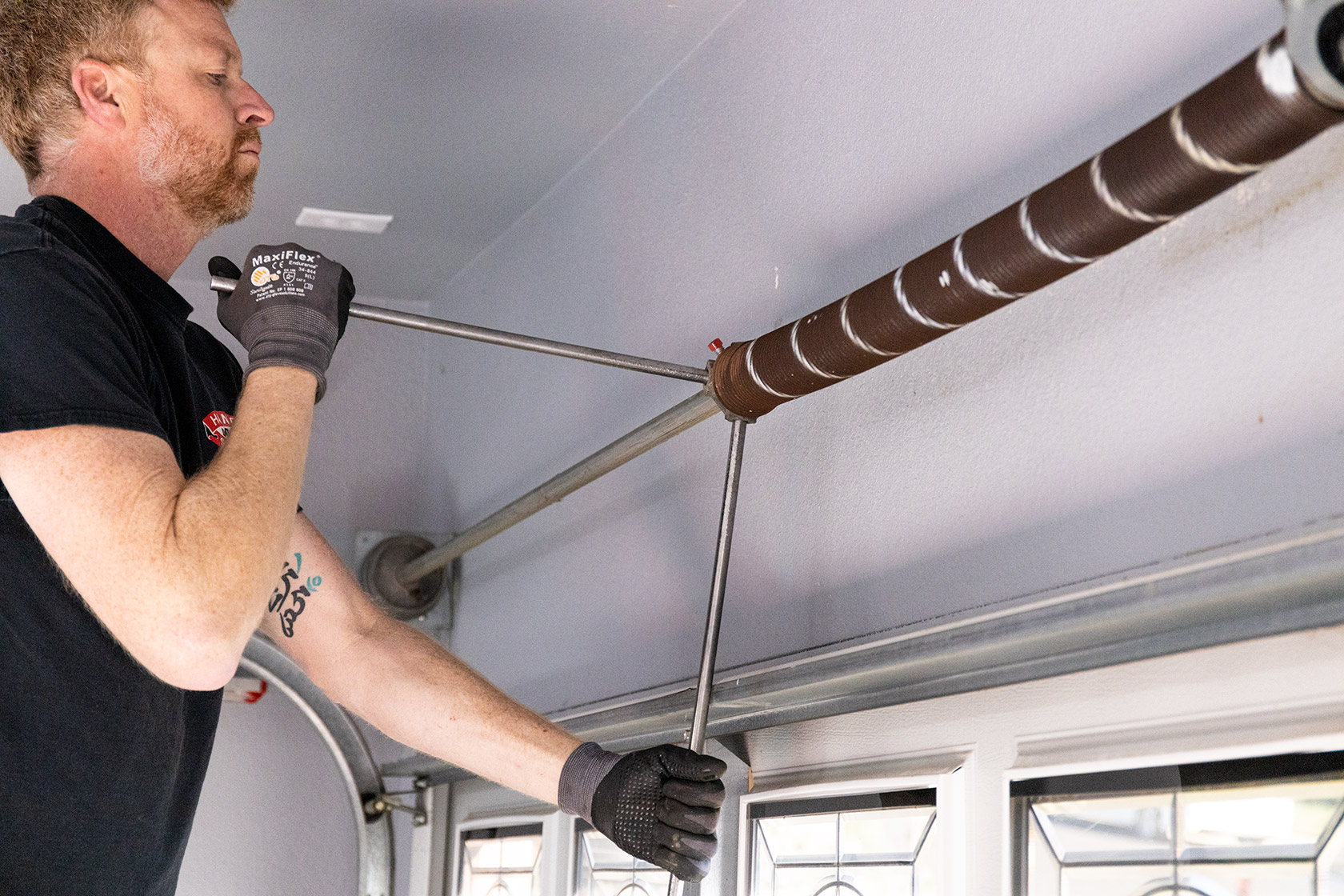 Replace Garage Door Spring Image